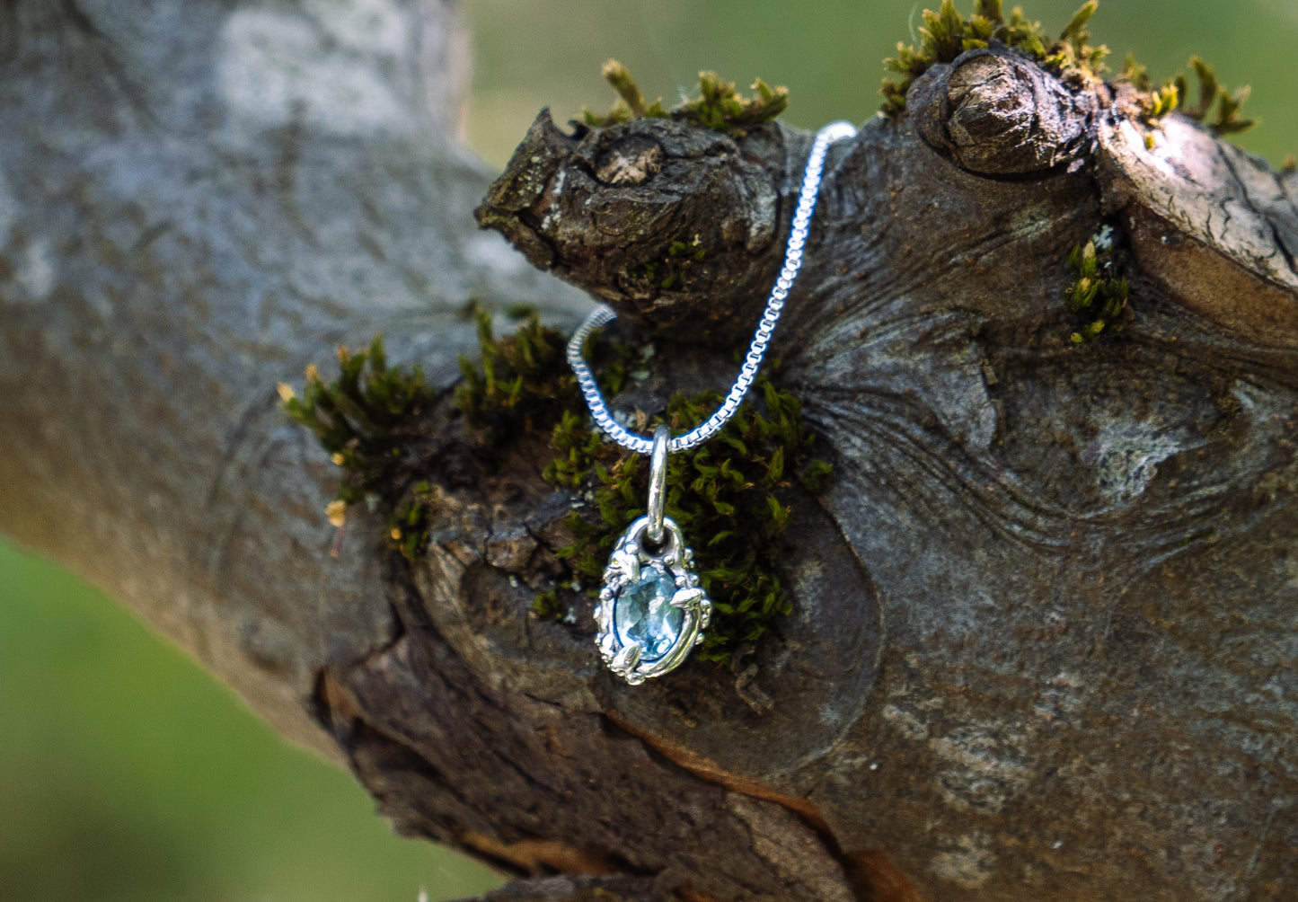 Ocean drop necklace with blue topaz