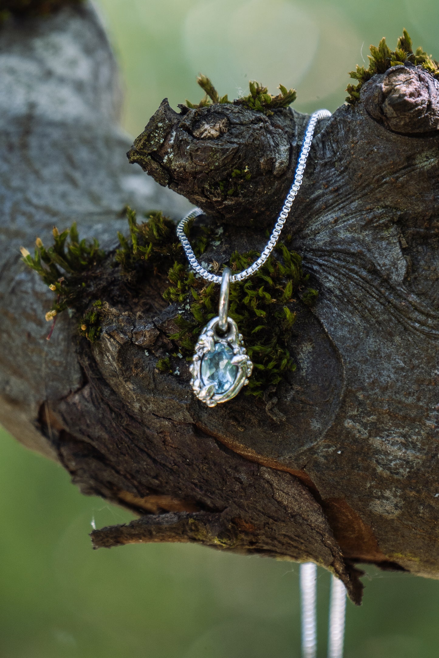 Ocean drop necklace with blue topaz