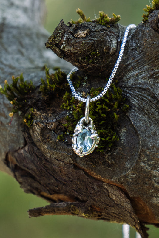 Ocean drop necklace with blue topaz